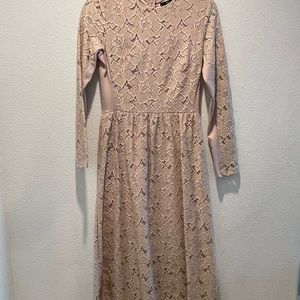 Dusty pink knee length dress, perfect for a day event.